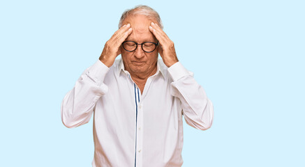 Senior caucasian man wearing business shirt and glasses with hand on head for pain in head because stress. suffering migraine.