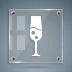White Glass of champagne icon isolated on grey background. Merry Christmas and Happy New Year. Square glass panels. Vector.