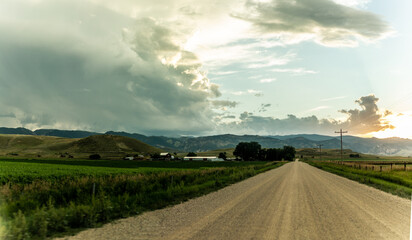 Fototapeta na wymiar Panorama shot of road at sunset in america countryside nature