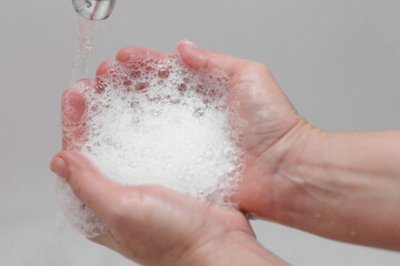 Fototapeta premium Hygiene. Cleaning Hands. Washing hands on sink.