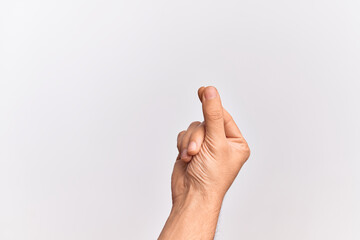 Hand of caucasian young man showing fingers over isolated white background holding blank space with thumb finger, business and advertising