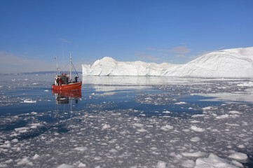 Icebergs in Disko Bay, Fishing boat, UNESCO World Heritage Site, Ilulissat, Jakobshavn, Greenland,...