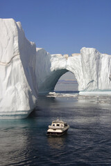 Icebergs in Disko Bay, Natural arch,Motorboat, UNESCO World Heritage Site, Ilulissat, Jakobshavn,...