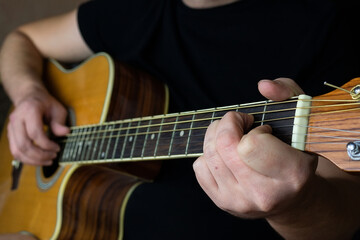 Naklejka na ściany i meble A man plays the guitar