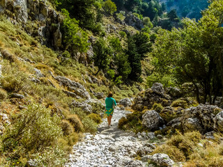 Fototapeta na wymiar Approaching the deeper section of the Imbros Gorge near Chania, Crete on a bright sunny day