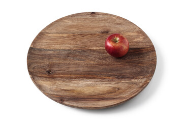 Apple on a wooden platter