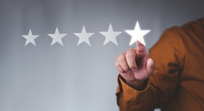 Customer service experience and business satisfaction survey, businessman touching with a screen Five stars (5) rating, Feedback, review and rating concepts.
