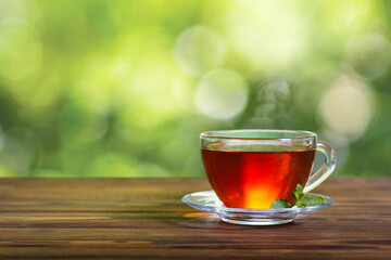 black tea with mint in glass cup