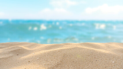 Fototapeta na wymiar sea sand and glittering water