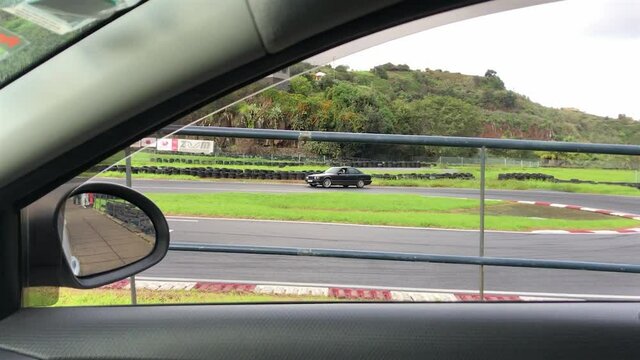 Watching a drifter form inside a car make that U turn during a race in Faial, Portugal