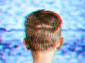3d anaglyph effect of a Boy watching television with screen noise.  Need stereo glasses to view in...