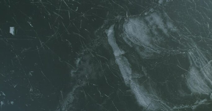 frozen river. Pattern of ice on the surface of the water. Background
