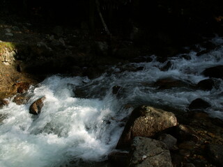 fast mountain river with clear boiling water