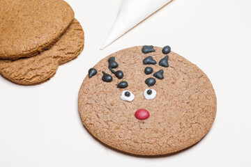 Christmas gingerbread Santa Deer cookies on a white background. Gingerbread Cookie
