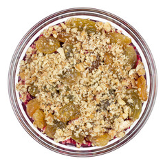 Beetroot salad with raisins and nuts on top isolated on white