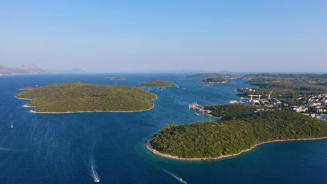 Boats and shipping port on Korčula island, Dalmatian coast Croatia, aerial view