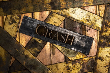 Crash text on vintage textured bronze grunge copper and gold background