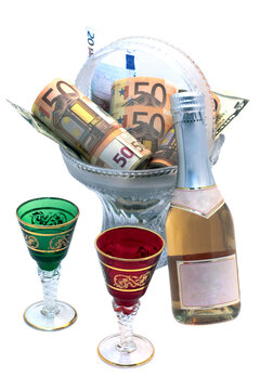 Banknotes rolled up in a roll, the bottle of wine