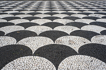 Mosaic tiles pavement in Funchal, Madeira, Portugal.