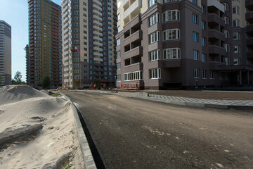 Road construction, courtyard area. Construction site. production of apartments, social housing.
