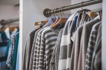 Elegant clothing in a store - shopping concept