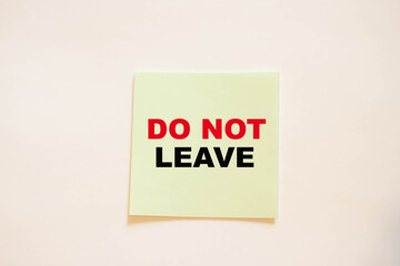 Square green paper with motivational words DO NOT LEAVE.