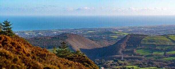 Panoramic view from the top of Great Sugar Loaf in Ireland, Wicklow near Dublin. Amazing weather
