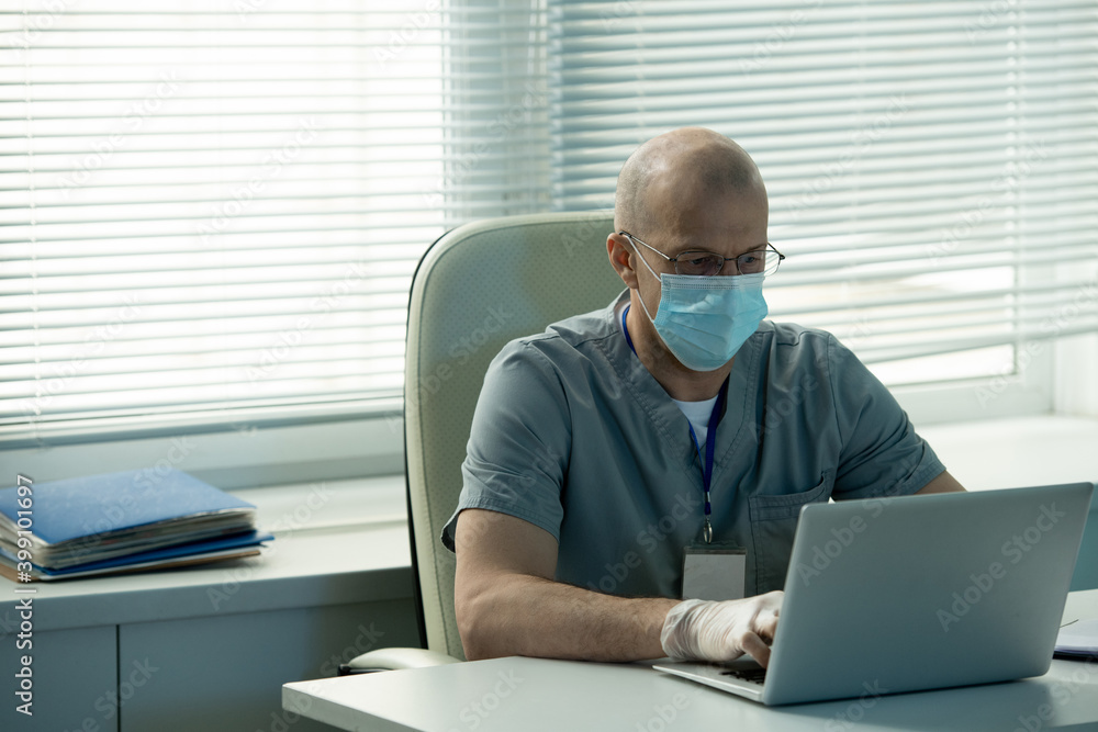 Aufkleber contemporary bald male scientist in protective mask and gloves networking