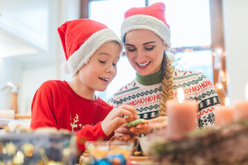 Family having fun baking cookies for Christmas