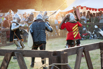 Fototapeta na wymiar Medieval Knights With Swords On Battlefield