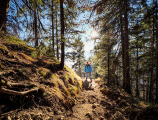 Hiking man in pure forest nature make fun 