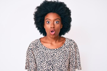 Young african american woman wearing casual clothes scared and amazed with open mouth for surprise, disbelief face