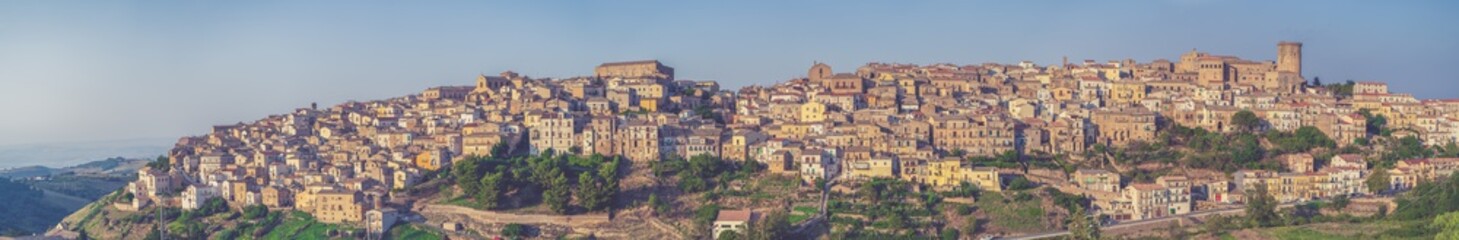 Fototapeta premium Tricarico town, Matera. Italy. Panorama wide view of Tricarico town on a hill. Basilicata apulia region