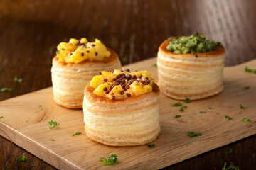 Puff pastry rolls filled with cheese and pesto