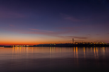 Obraz na płótnie Canvas Galati Town and Danube River in sunset, Romania
