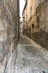 Fototapeta na wymiar small street in historical town Ascoli Piceno, Italy