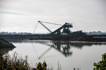 bucket chain excavator at the quarry pond © Vollverglasung