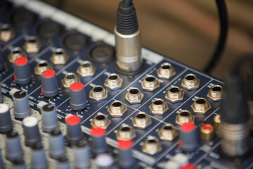 Naklejka premium DJ remote to control the sound while recording music