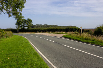 Fototapeta premium Looking North along the A18 road near Wyham in Lincolnshire, England, UK.