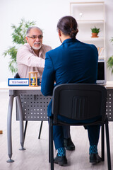Young male lawyer and old man in testament and time management c