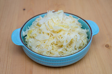sauerkraut in a blue bowl, food