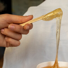wax spoon for depilating the skin with wax