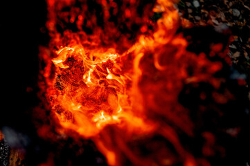 Fototapeta na wymiar burning stump, sparks texture, fire, flame