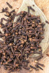 Dried cloves, Syzygium aromaticum on a wooden table