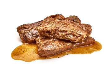 Cooked pork ribs with sauce, isolated on white background