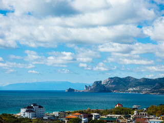 Seascape rock, beach and sea. Travel and Leisure.