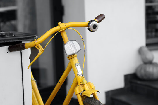 Retro bicycle on restaurant background.Stylish decoration.Trendy grey background.