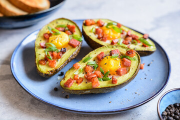 Avocado egg boats with bacon and green onion