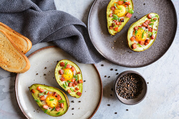 Avocado egg boats with bacon and green onion