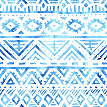 Seamless watercolor tribal pattern. White and blue geometric print. Ethnic and aztec motifs. Ornament for textiles, home decor, packaging. Vector illustration.